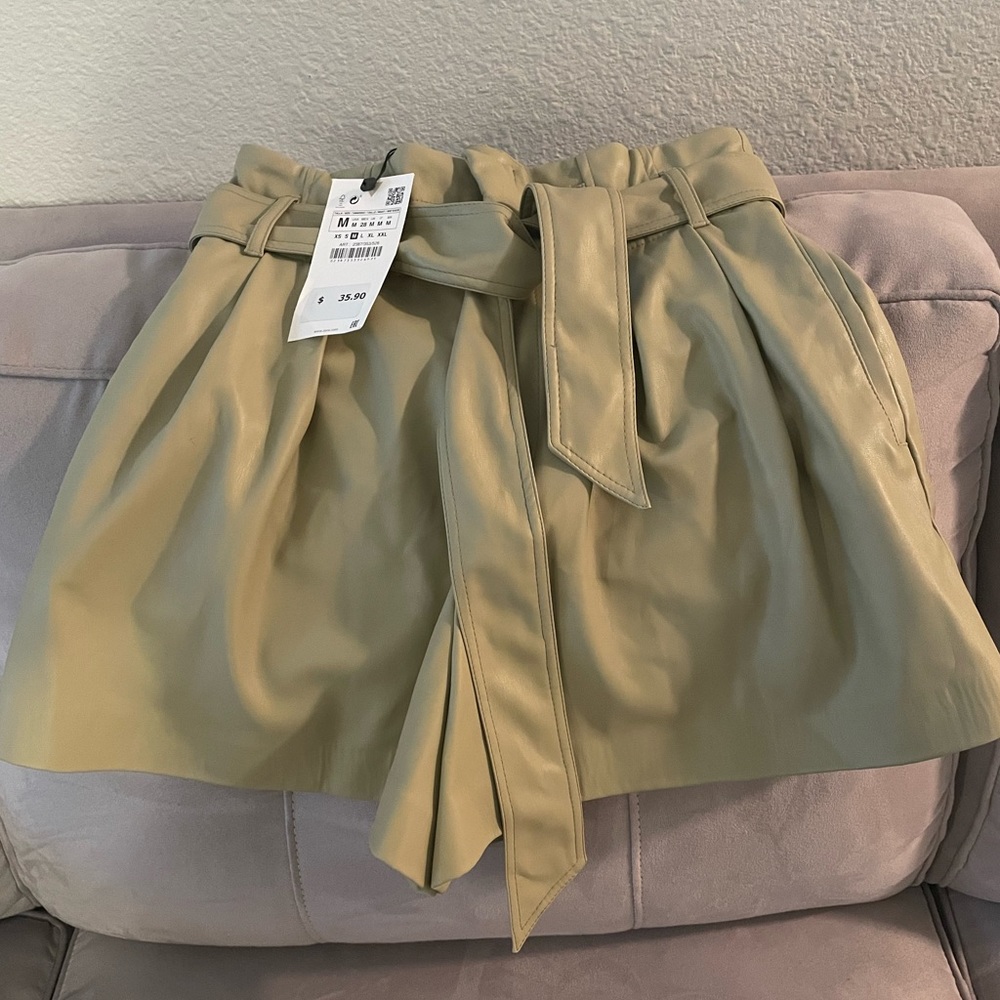 Green leather high waisted shorts from Zara never worn .